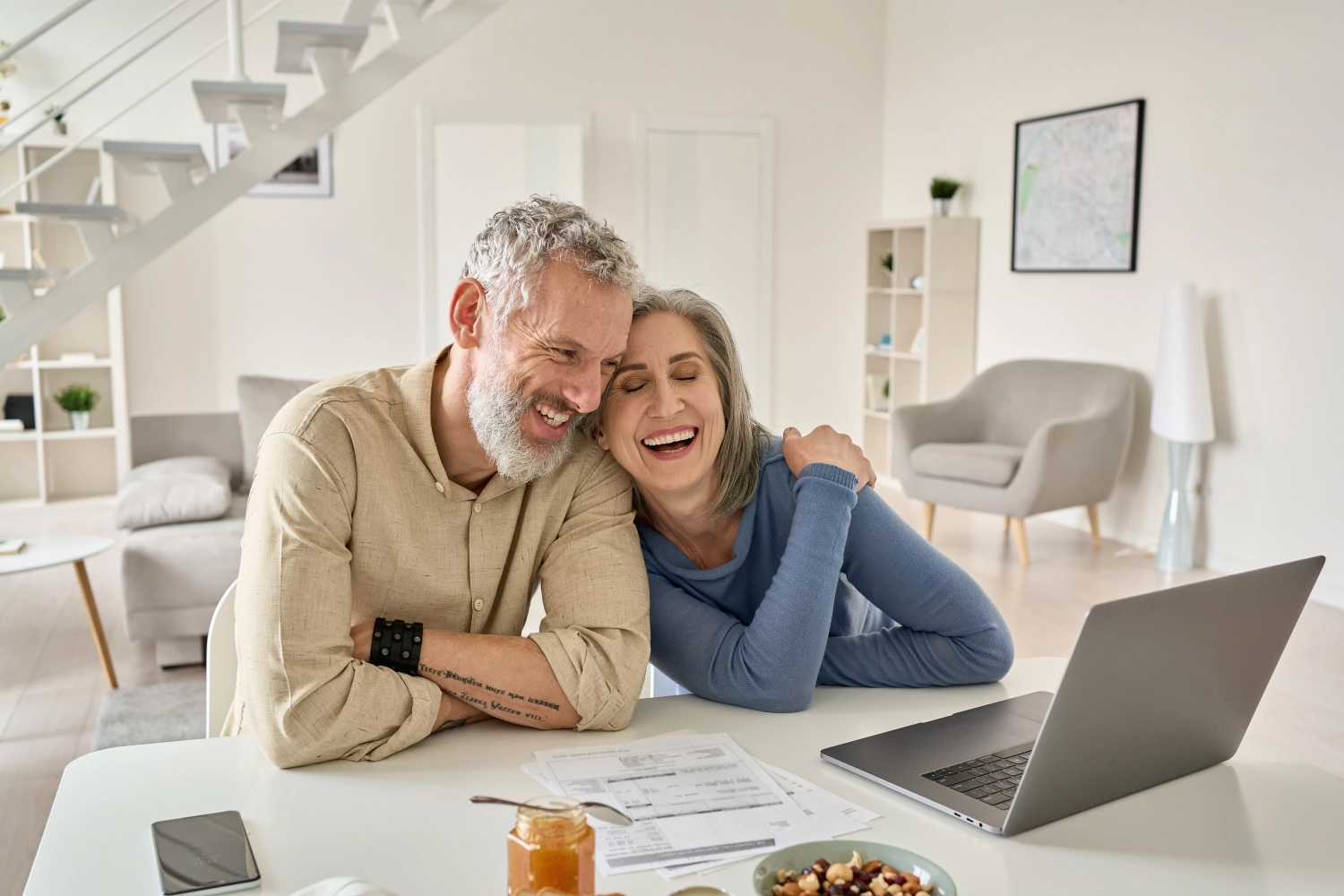 Two people learning about personal finance together at home